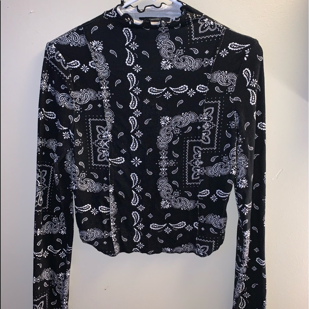 Gently worn,Long sleeve black bandanna shirt with cute swirly turtleneck.